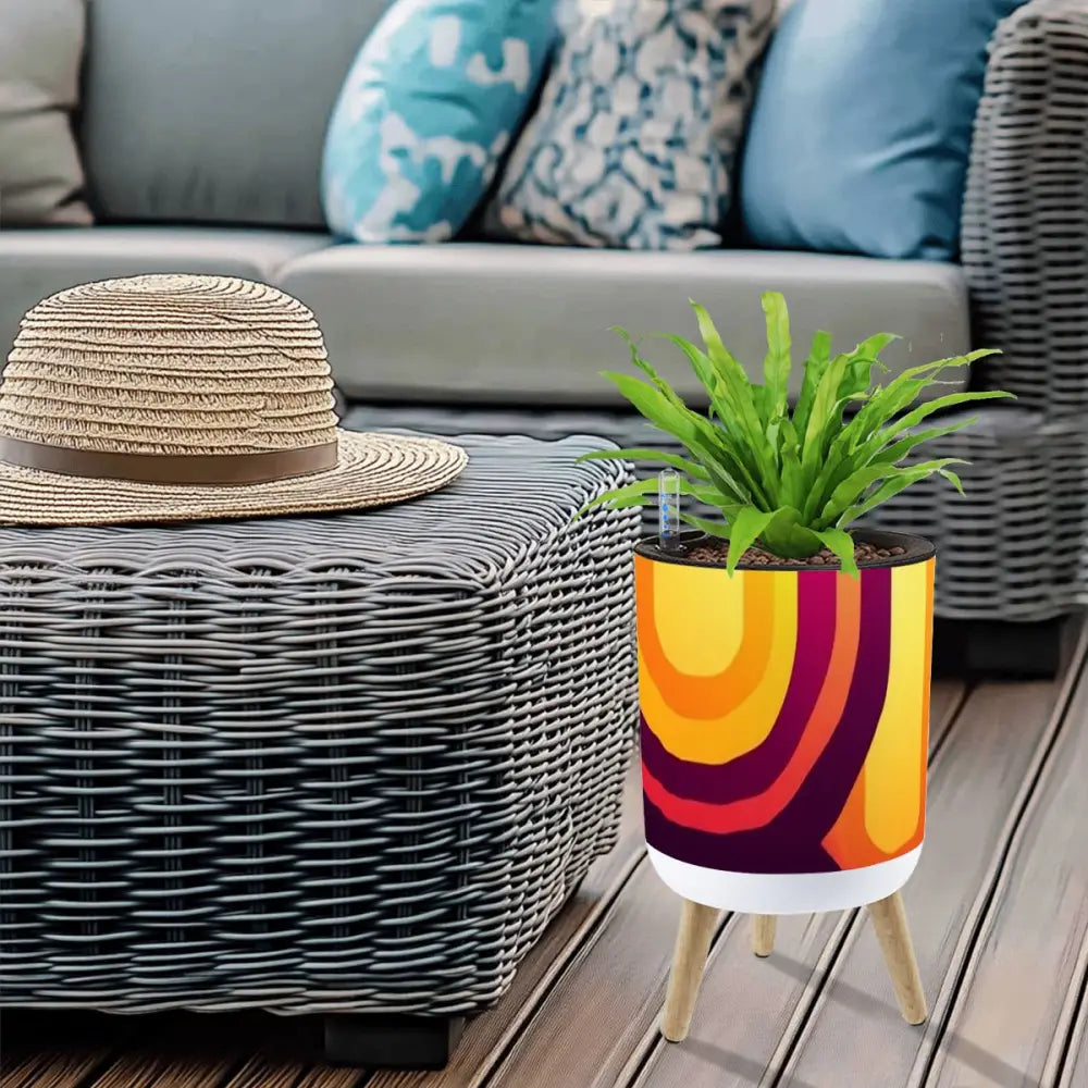 Retro-Blumentopf im Scandi-Stil der 70er mit Holzbeinen: gelb, orange