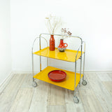 Iconic egg-yolk 1970s FOLDABLE SERVING TROLLEY Dinett by Bremshey