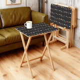 Botanical Black retro TV tray set of 4, in a living room beside an olive sofa
