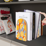 Citrus retro wooden bookend on a dark shelf with books