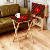 Poinsettia Plaid retro TV tray set of 4, in a living room beside an olive sofa