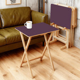 Dark Berry retro TV tray set of 4, in a living room beside an olive sofa