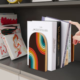 Rainbow Arcs retro wooden bookend on a dark shelf with books