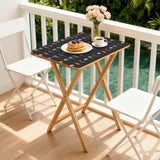 Botanical Black retro TV tray set of 4, on a balcony with coffee and pastries