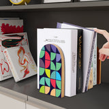 Geometric Tiles retro wooden bookend on a dark shelf with books