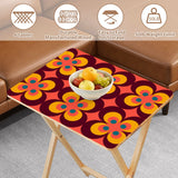 Orange Flower Power retro TV tray set of 4, tabletop close-up with fruit bowl