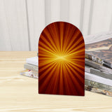 Close-up of the Orange Sunburst retro wooden bookend beside stacked magazines