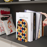 Multicolor Dots retro wooden bookend on a dark shelf with books