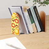 Mod Rectangles retro bookend holding books on a wooden desk next to a pen