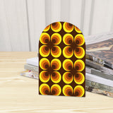 Close-up of the Orange Clover retro wooden bookend beside stacked magazines