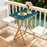 Atomic Cocktail Teal retro TV tray set of 4, on a balcony with coffee and pastries