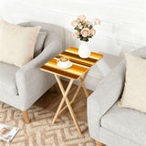 Brown Gold Stripes retro TV tray set of 4, next to a grey sofa with flowers