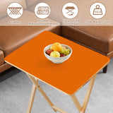 Burnt Orange retro TV tray set of 4, tabletop close-up with fruit bowl