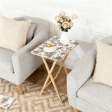Black Toile de Jouy retro TV tray set of 4, next to a grey sofa with flowers