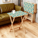 Atomic Cat Teal retro TV tray set of 4, in a living room beside an olive sofa