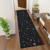 Retro atomic stars hallway runner rug on a wooden hallway floor with a potted plant