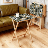 Atomic Bottles Olive retro TV tray set of 4, in a living room beside an olive sofa
