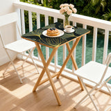 Gold Ginkgo retro TV tray set of 4, on a balcony with coffee and pastries