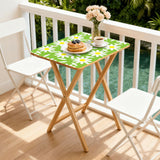 Green Daisy retro TV tray set of 4, on a balcony with coffee and pastries