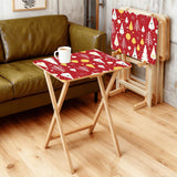 Red Christmas Trees retro TV tray set of 4, in a living room beside an olive sofa