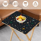 Atomic Stars Black retro TV tray set of 4, tabletop close-up with fruit bowl