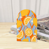 Close-up of the Citrus retro wooden bookend beside stacked magazines