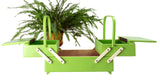 Styled illustration of a vintage 1950s lime green sewing box with lids folded out and a fern on top
