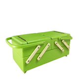 Vintage 1950s lime green sewing or jewelry box – low side view, closed, lid and ivory struts