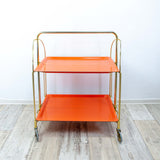 Iconic orange golden 1970s FOLDABLE BAR CART 'Dinett' by Bremshey