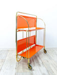 Iconic orange golden 1970s FOLDABLE BAR CART 'Dinett' by Bremshey