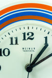 1970s MIDCENTURY WALL CLOCK by Weimar Eastgermany, white orange blue