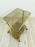 Two 1970s Golden Smoked Glass TEA TROLLEYS, bar carts, BEDSIDE TABLES