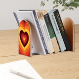 Rainbow Heart retro bookend holding books on a wooden desk next to a pen
