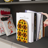 Orange Clover retro wooden bookend on a dark shelf with books