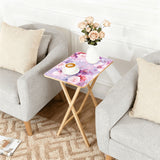 Pink Watercolor Roses retro TV tray set of 4, next to a grey sofa with flowers