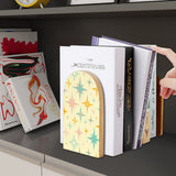 Atomic Stars retro wooden bookend on a dark shelf with books