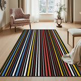 Dark striped area rug 3x5 ft with colorful thin stripes in a bright room beside a floral armchair and side table