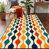 Top view of blue and orange wavy pattern area rug 3x5 ft on a wood floor beside an armchair with an orange throw