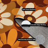 Folded corner of the daisy pattern rug showing soft surface, edge binding and anti-slip TPR backing