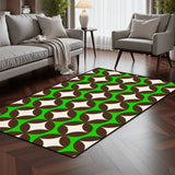 Green and brown geometric area rug 3x5 ft in a living room with a gray sofa and armchair on dark wood flooring