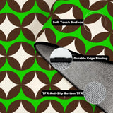 Folded corner of the geometric rug showing soft surface, edge binding and anti-slip TPR backing