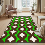 Green and brown geometric area rug 3x5 ft in a bright room beside a floral armchair and side table