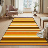 Gold and brown striped area rug 3x5 ft in a bright room beside a floral armchair and side table