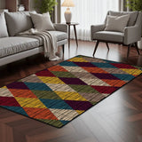 Burgundy navy yellow diamond pattern area rug 3x5 ft in a living room with a gray sofa and armchair on dark wood flooring