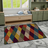 Burgundy navy yellow diamond pattern area rug 3x5 ft on gray marble flooring by a window bench and green cabinets