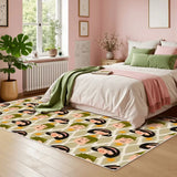 Pink bedroom with a 4x6 ft area rug, beige with green and black retro faces, by the bed