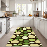 Green polka dot area rug 3x5 ft in front of white kitchen cabinets