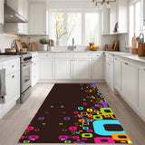 Dark brown 3x5 ft area rug with colorful rounded squares in a white kitchen