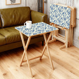 Blue Floral Toile retro TV tray set of 4, in a living room beside an olive sofa