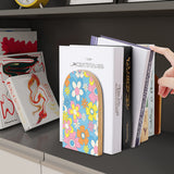 Pastel Daisy retro wooden bookend on a dark shelf with books
